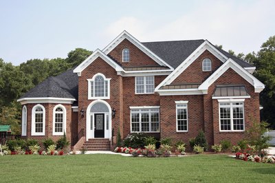 Exterior of a beautiful brick home with garden