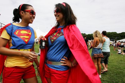 Costumed Supergirls at festival