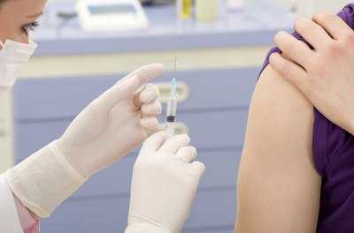 woman about to receive measles vaccine