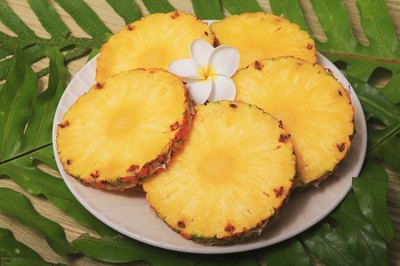 Sliced pineapple on a platter