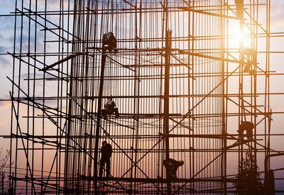 Specially trained workers on scaffolding