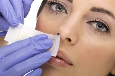 Woman at dermatologist.