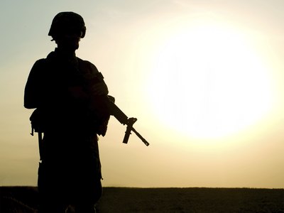 Private military contractors work alongside or in place of military personnel.