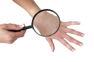 Use magnifying glass to look for debris.