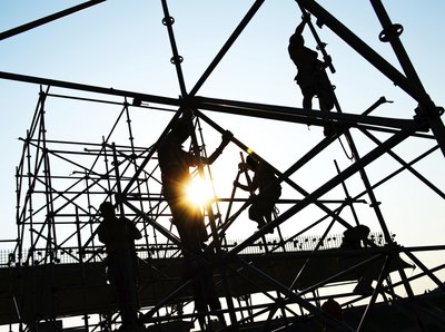 Workers on scaffolding platform
