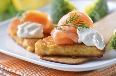 Smoked salmon is prepared in a similar manner to lox.