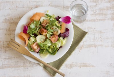 Healthy salad on table.