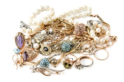 Assorted jewelry on white background.