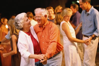 Family dancing at birthday party