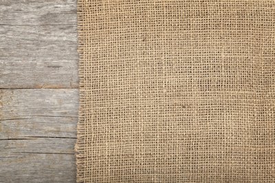 Burlap material on a wood surface.