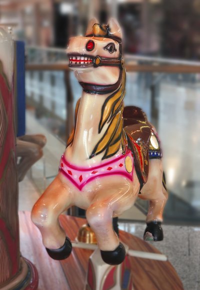 Close-up of a wooden horse.