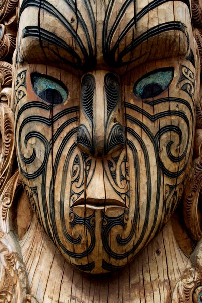 A close-up of a Maori wood carving.