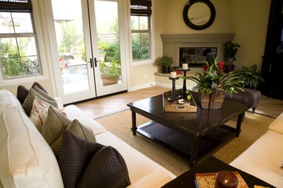 An area rug in front of the fireplace.