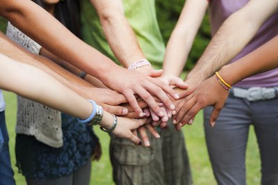 A group of teenagers form a team.