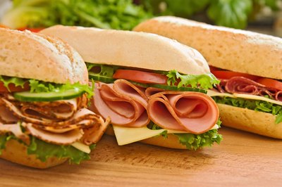 Consider purchasing "nitrate free" versions of lunch meat and hot dogs.