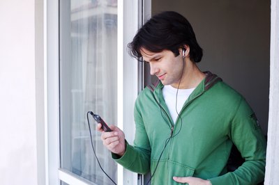 young man on ipod