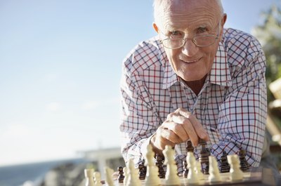 Senior citizen playing chess.