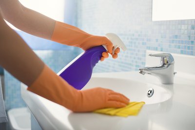 Wash all hard surfaces with antibacterial soap and water.