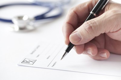 Doctor writing prescription
