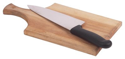 A knife and cutting board are basic kitchen supplies.