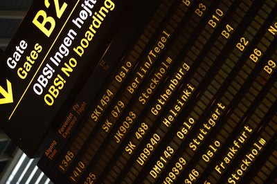 Get the traveler's destination, departure and return dates and airline and seating preferences.