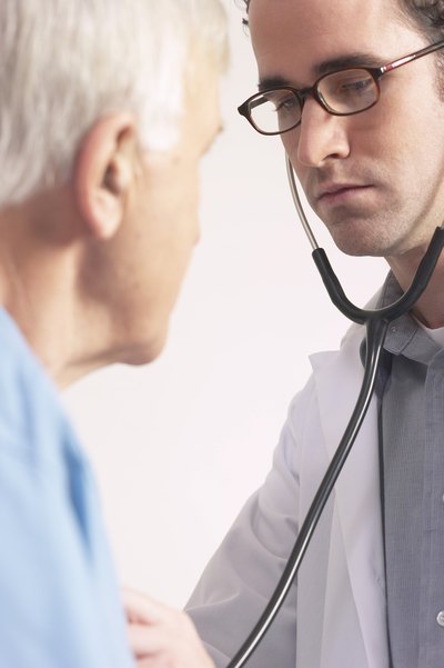 Doctor with elderly patient