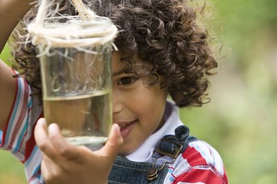 boy with jar of mixture