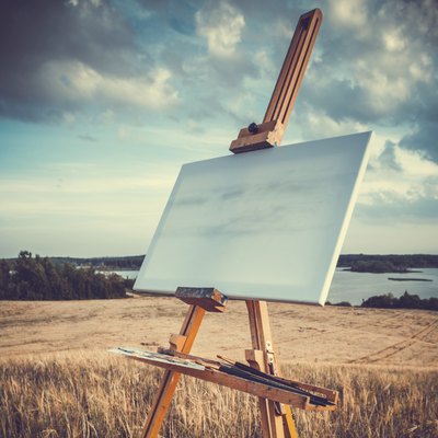Canvas and easel at coast