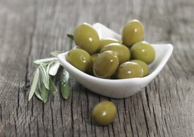 Small bowl of green olives.