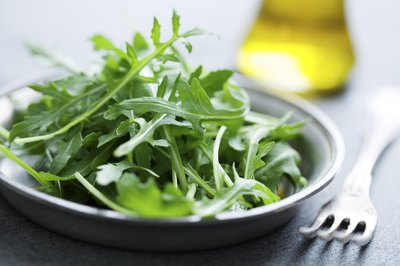Baby arugula with olive oil.