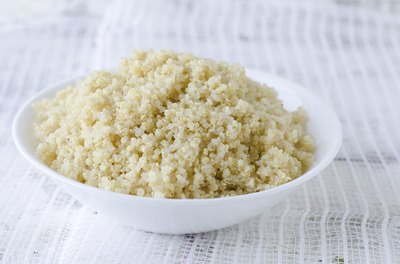 A bowl of cooked quinoa.