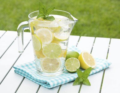 Homemade lemonade with lemons and limes