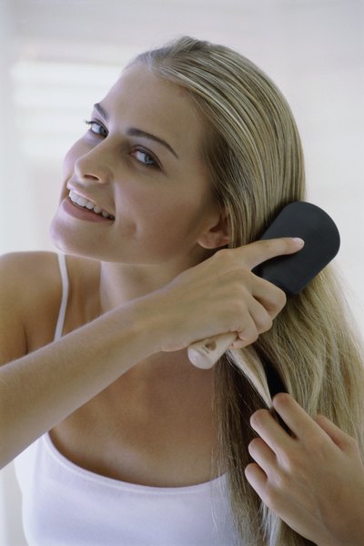 Woman brushing her hair