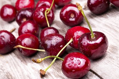 Cherries on table top.
