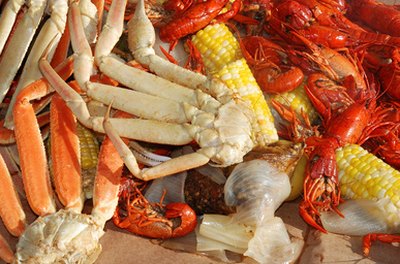 steaming crab legs and veggies image by jcpjr from Fotolia.com
