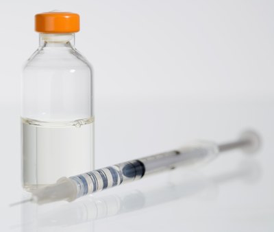 Creatas Images/Creatas/Getty Images As with humans, sometimes diabetic dogs require insulin shots.