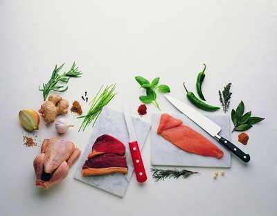Stockbyte/Stockbyte/Getty Images Raw dog food can be fresh, frozen or dehydrated.