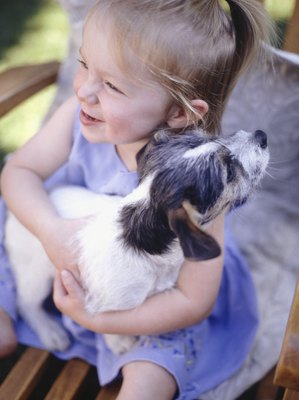 Ryan McVay/Digital Vision/Getty Images Young children are especially at risk for contracting zoonotic parasites.