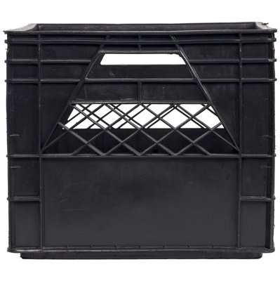Ablestock.com/AbleStock.com/Getty Images One crate makes a cozy house for smaller dogs.