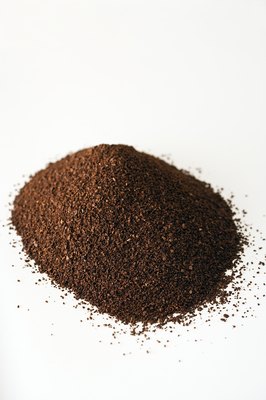 Jupiterimages/Photos.com/Getty Images Coffee grounds are a danger to all dogs.