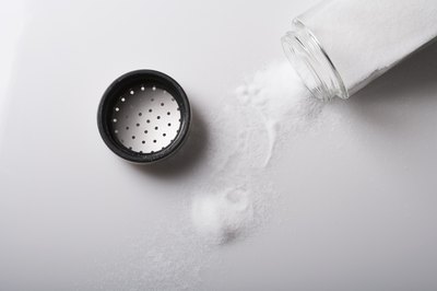 Jupiterimages/Pixland/Getty Images You may enjoy salted and seasoned meat, but it is not good for your puppy.