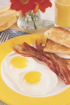 Comstock/Comstock/Getty Images It's breakfast time for you and your pup -- it's okay to give him a little of your classic B&E -- if you're in the mood to share.