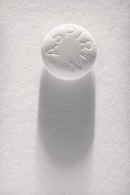 Jupiterimages/Photos.com/Getty Images Dogs occasionally throw up blood due to aspirin toxicity.