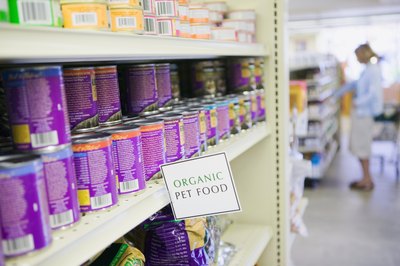 Jupiterimages/Creatas/Getty Images Some natural pet foods don't include sodium nitrite.