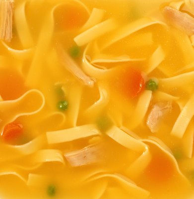 Brand X Pictures/Brand X Pictures/Getty Images Chicken soup can be a dog's delight.