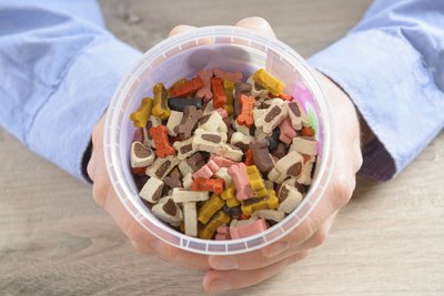 humonia/iStock/Getty Images Grains can provide certain nutrients necessary to canine health.