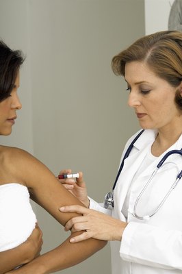 Medioimages/Photodisc/Photodisc/Getty Images Your physician can determine if a tetanus shot is needed after a dog bite.