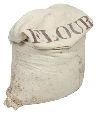 Hemera Technologies/PhotoObjects.net/Getty Images Some kinds of flour are better for dogs than other kinds.