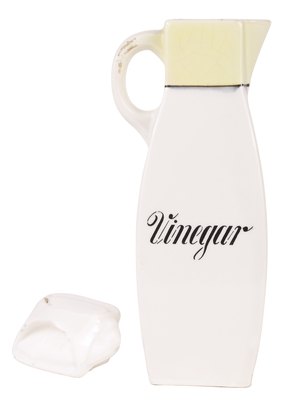 Hemera Technologies/PhotoObjects.net/Getty Images Vinegar is a natural flea repellant.