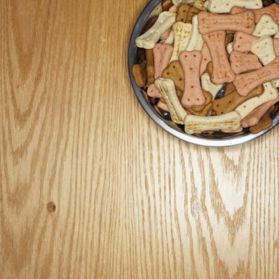 Brand X Pictures/Brand X Pictures/Getty Images As our dogs age, we may need to make some dietary changes